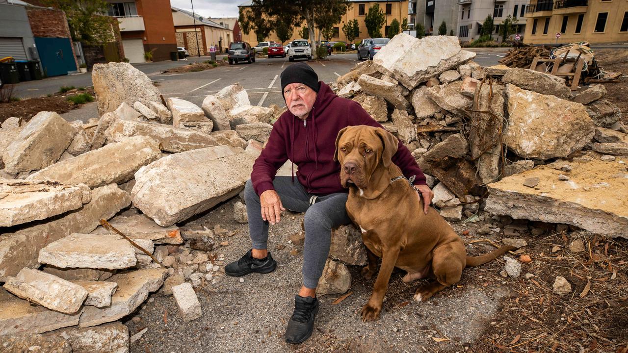 Port Adelaide resident Alan Bennet with his dog Floyd in front of dumped construction waste on McLaren Pde. Picture: Tom Huntley