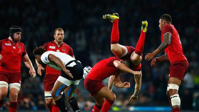 Mike Brown of England is up-ended during the Rugby World Cup match against Fiji at Twickenham.