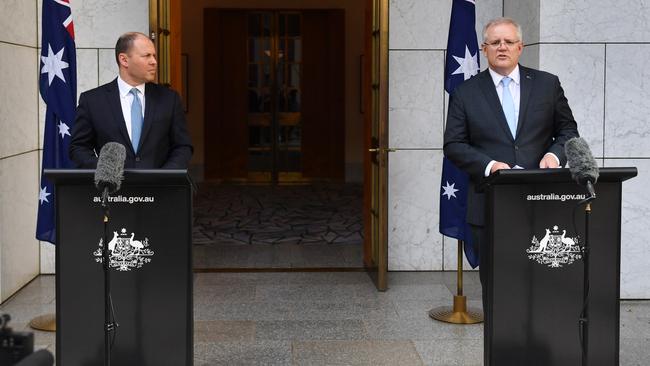 Treasurer Josh Frydenberg and Prime Minister Scott Morrison announce the government's $130b wage subsidy package at a press conference at Parliament House in Canberra. Picture: AAP