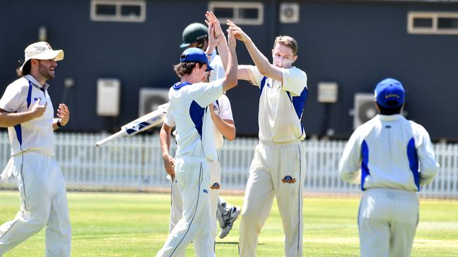 First grade club cricket action between Wynnum-Manly and Sandgate-Redcliffe.