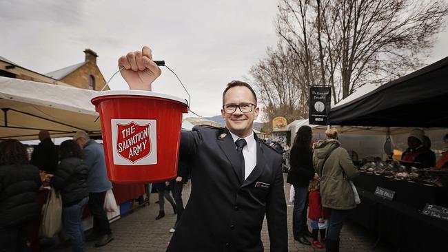 Major Brad Watson, of the Salvation Army, rattling his tin for the Red Shield Appeal in Salamanca Market. Picture: MATHEW FARRELL