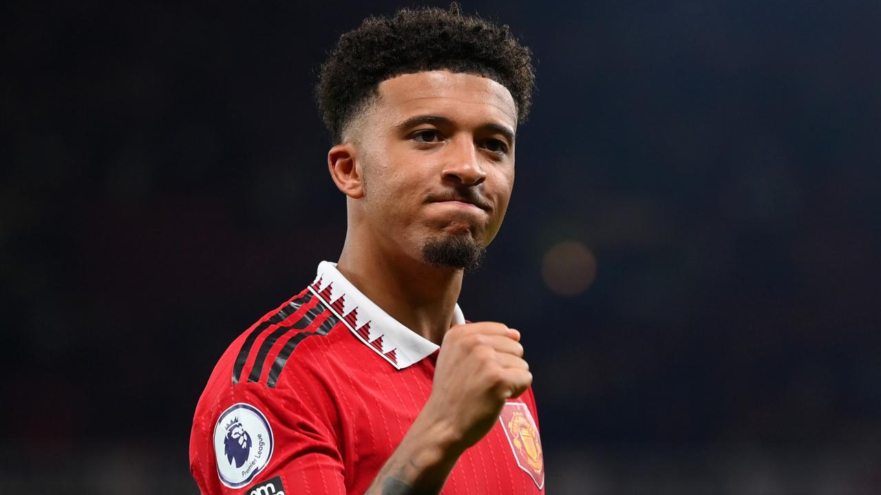 MANCHESTER, ENGLAND - AUGUST 22: Jadon Sancho of Manchester United celebrates after victory in the Premier League match between Manchester United and Liverpool FC at Old Trafford on August 22, 2022 in Manchester, England. (Photo by Michael Regan/Getty Images)