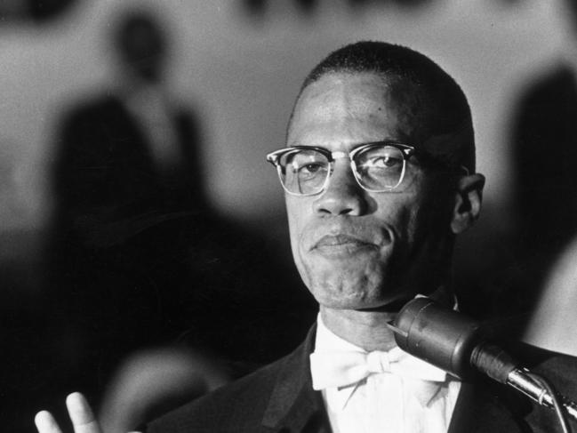 FILE - FEBRUARY 17, 2015: February 21st sees the anniversary of 50 Years Since The Assassination Of Malcolm X circa 1962: American political activist and radical civil rights leader, Malcolm X (1925 - 1965) standing at a podium during a rally of African-American Muslims held in a Washington, DC arena. He is wearing a formal jacket and a white bow-tie. (Photo by Richard Saunders/Hulton Archive/Getty Images)