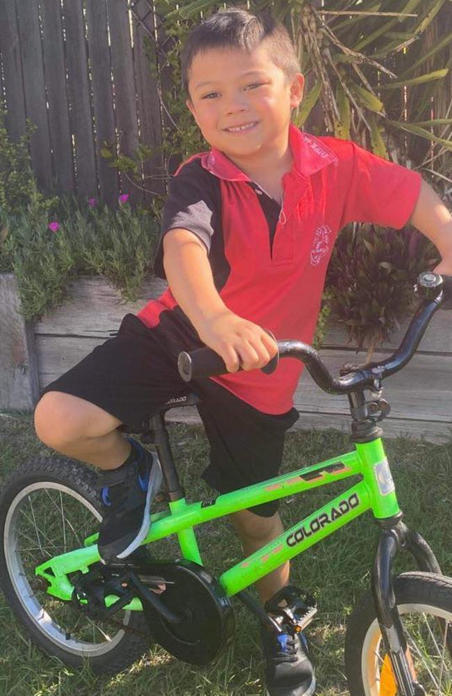 Jett Roberts with his new bike generously donated by Michael Street. Photo: Ming Roberts.