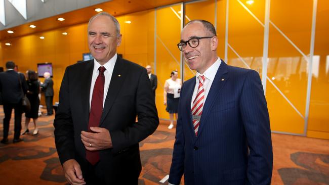 NAB Chairman Ken Henry and CEO Andrew Thorburn chat with shareholders before the AGM at Melbourne Convention Centre last year. Picture: David Geraghty.