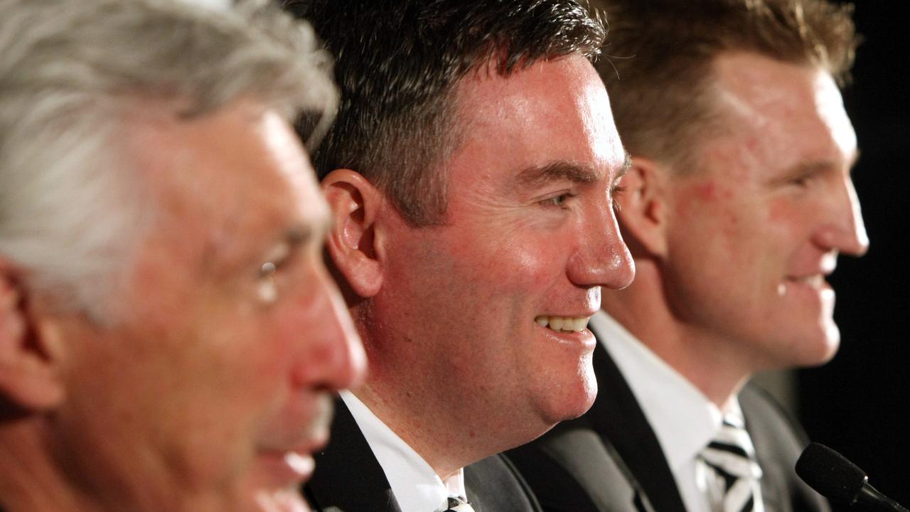 Way back when: Collingwood President Eddie McGuire announces Mick Malthouse will continue coaching position and Nathan Buckley (right) comes on Assistant Coach.