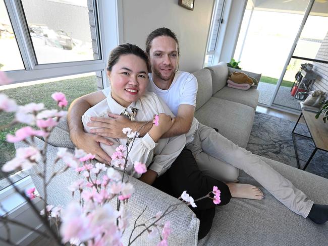 19/7/2024: Mavis Tang 30 and William Naviaux 31, who built their first house in Browns Plains, Brisbane. Hundreds of people are flocking to afford a home in the suburb.  pic: Lyndon Mechielsen/Courier Mail