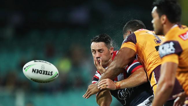 Cooper Cronk cops a sickening late shot from Tevita Pangai Jnr. Picture: Phil Hillyard