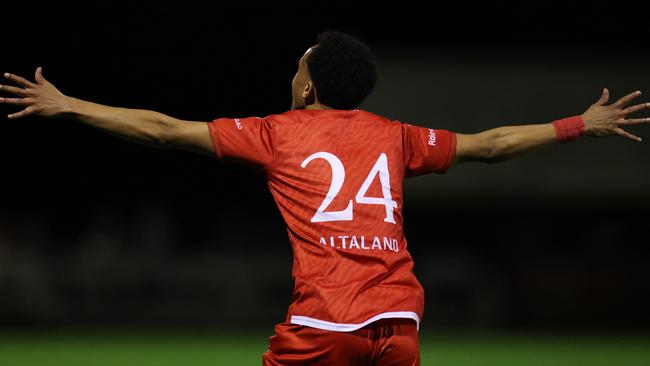 Aamir Abdullah celebrates a goal for Hume City.