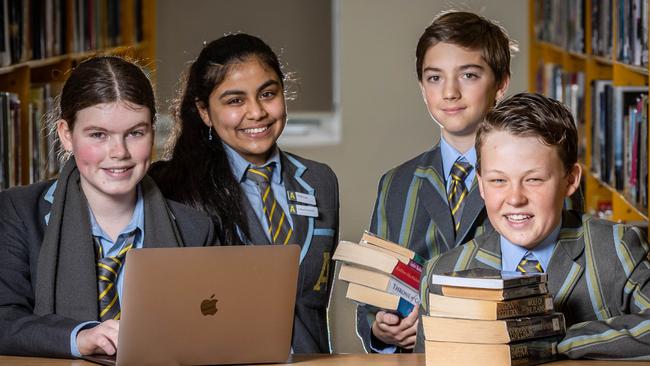 Albert Park College students Millie, 14, Angel, 13, Joe, 14 and Lachlan, 13. Picture: Jake Nowakowski