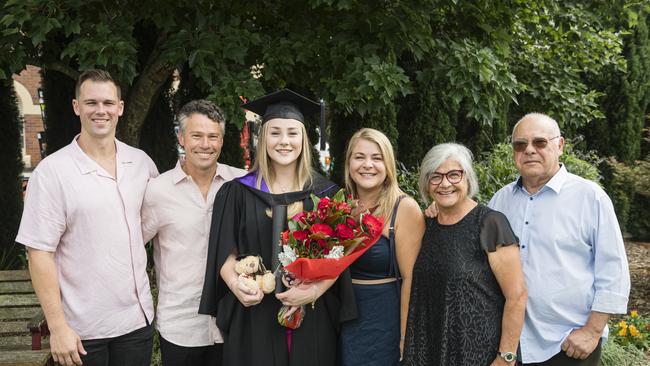 Bachelor of Laws graduate Brianna Wooller with family (from left) Jayden Hodgson, Jamie Wooller, Katie Wooler, Dahlia Da Costa and Frank Da Costa at a UniSQ graduation ceremony at Empire Theatres, Wednesday, February 14, 2024. Picture: Kevin Farmer