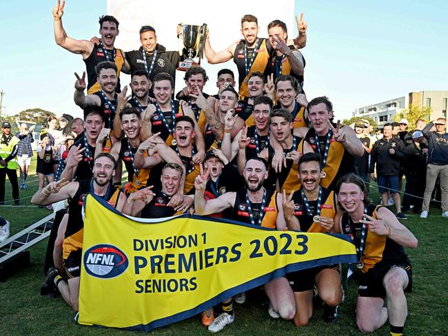 Heidelberg celebrate after winning the NFNL Division 1 grand final between Heidelberg and Bundoora at Preston City Oval in Preston, Saturday, Sept. 23, 2023. Picture: Andy Brownbill