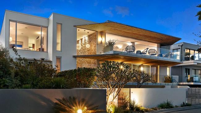 The clifftop home in North Curl Curl was built in 2010 by glamour property developers Jennifer Hawkins and Jake Wall.