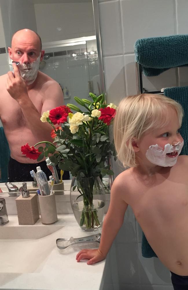 Stevie as a toddler shaving with dad David.