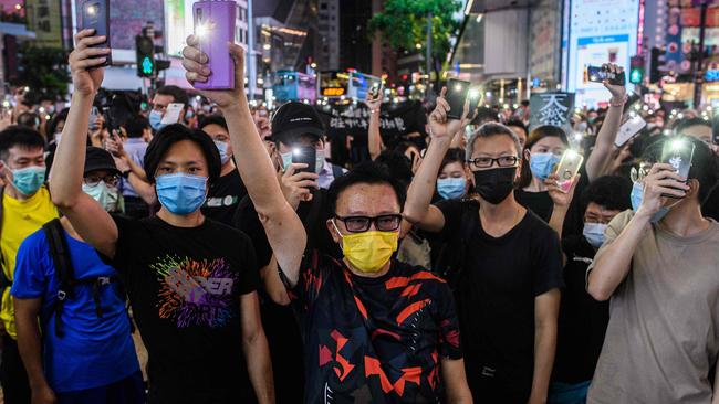 The accounts portrayed Hong Kong protesters as violent and as cockroaches. Picture: AFP