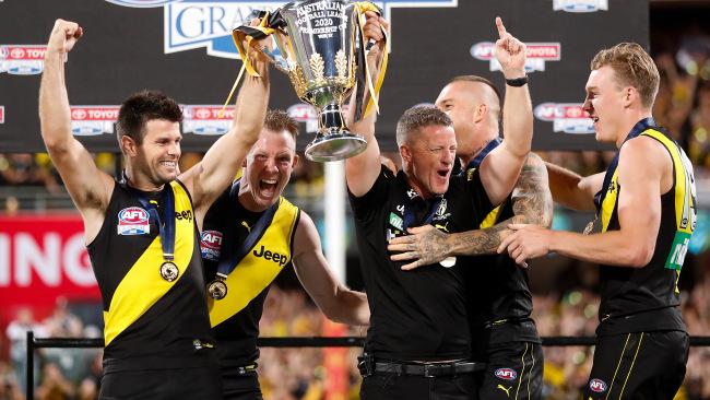 Damien Hardwick and Trent Cotchin kickstart the Richmond celebrations.