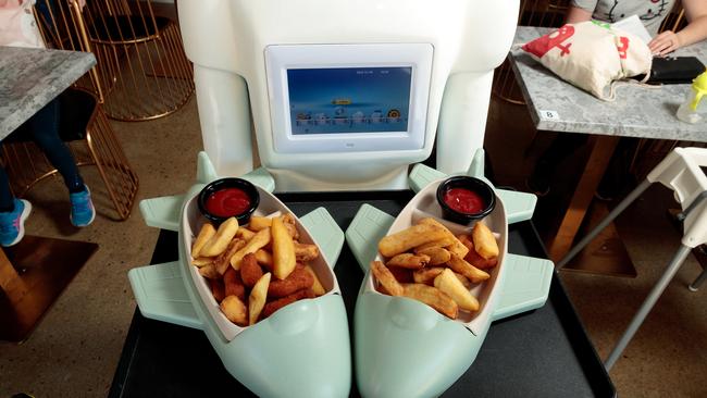 Meals are served in spaceships at Spacewalk Cafe.