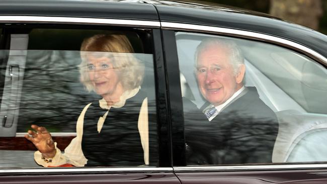 King Charles and Queen Camilla wave as they leave by car from Clarence House in London on February 6. Picture: Henry Nicholls/AFP