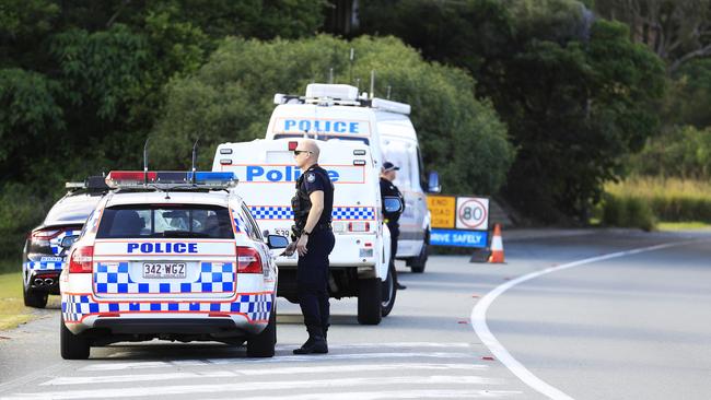 Queensland Police set up a roadblock due to the coronavirus at the NSW / Queensland Border on the old Pacific Highway at Coolangatta. Photo: Scott Powick Newscorp