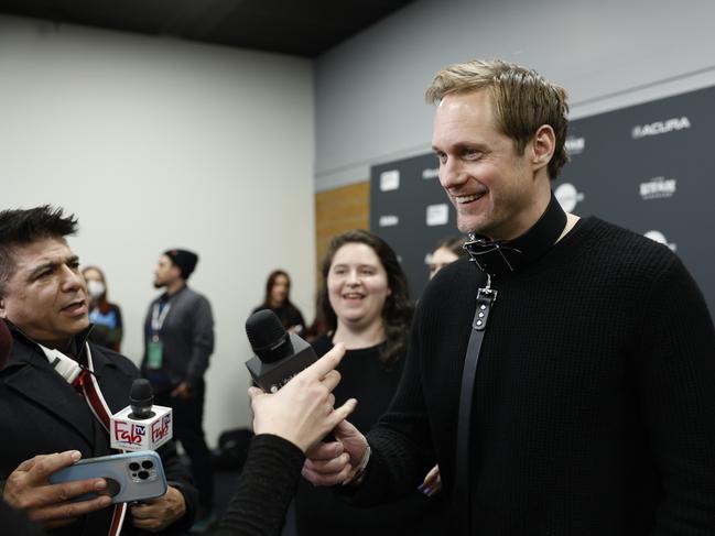Skarsgard wearing a dog collar at the Sundance Film Festival