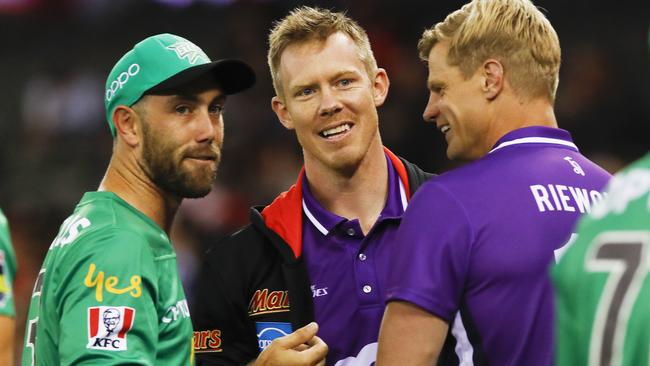 Maxi gets some hitting tips from AFL cousins Jack and Nick Riewoldt. Picture: Getty Images