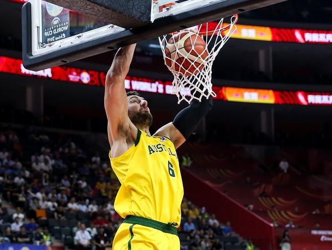 Andrew Bogut of Australia dunks the ball during the 2019 FIBA World Cup, first round match between Australia and Senegal. Picture: Zhizhao Wu/Getty Images