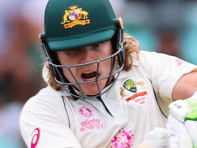 TOPSHOT - Australia's Will Pucovski plays a shot during the first day of the third cricket Test match between Australia and India at the Sydney Cricket Ground (SCG)in Sydney on January 7, 2021. (Photo by DAVID GRAY / AFP) / -- IMAGE RESTRICTED TO EDITORIAL USE - STRICTLY NO COMMERCIAL USE --