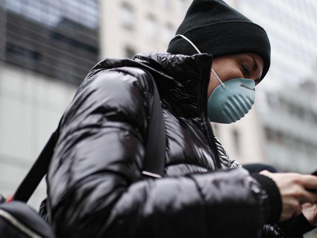 A pedestrian in New York City. The state has about 10 times more cases than any other US state. Picture: AP