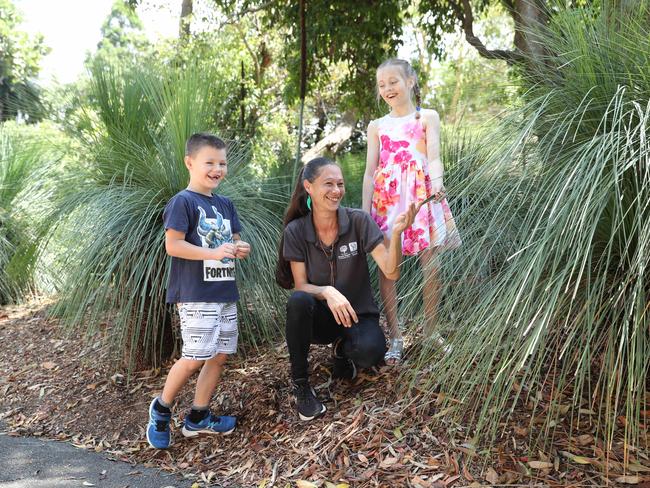 Renee Cawthorne teaches young visitors to the Royal Botanic Garden about Indigenous culture. Picture: Tim Hunter.