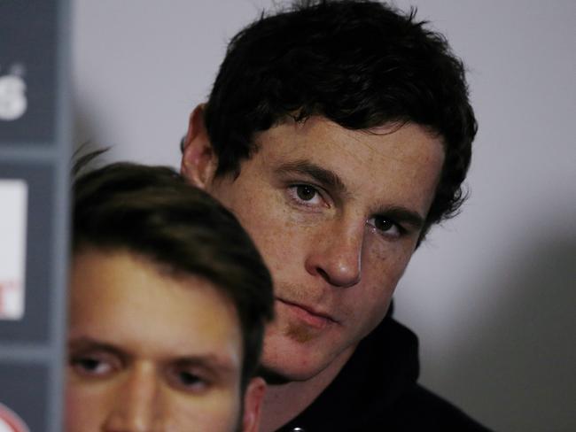 Jake Carlisle watches James Hird’s farewell press conference on Tuesday. Picture: Wayne Ludbey