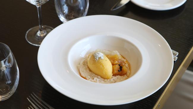 Soursop and coconut rice pudding with caramelised pineapple, passionfruit and kaffir lime at Blackbird. Picture: AAP/Ric Frearson