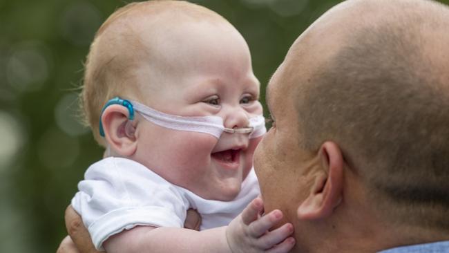 Levi Atkinson plays with his dad Rod. Picture: Floss Adams