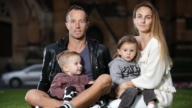 Scott and Tammy Hobson with children Tanner (2) and Tucker (3). More and more families are in “energy debt”. Picture: Christian Gilles