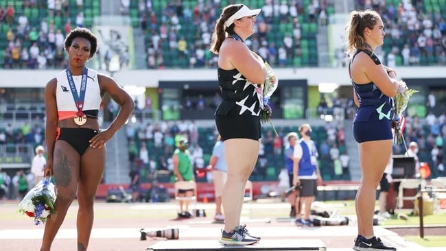 Gwen Berry (left), DeAnna Price, and Brooke Andersen during the national anthem at Saturday’s US Olympic trials. Picture: Patrick Smith/Getty Images