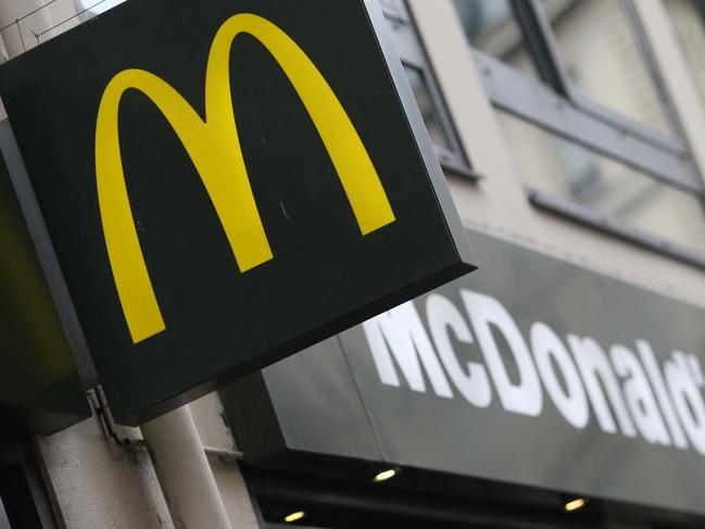 (FILES) This photograph taken on January 22, 2014 in Paris, shows the logo of a US fast food restaurant McDonald's. The fast food brand McDonald's will be the "title partner" of Ligue 1 for the next three seasons, and will succeed Uber Eats, the Professional Football League (LFP) announced on March 21, 2024. (Photo by Kenzo TRIBOUILLARD / AFP)