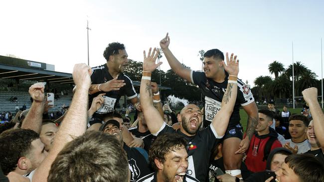 Redfern All Blacks A-Grade celebrate their victory. Picture: John Appleyard