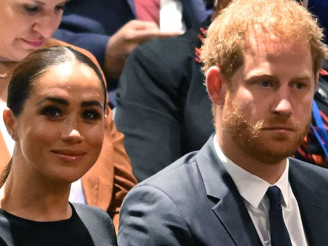 (FILES) Prince Harry (R) and Meghan Markle (L), the Duke and Duchess of Sussex, attend the 2020 UN Nelson Mandela Prize award ceremony at the United Nations in New York on July 18, 2022. A multi-million-dollar deal between a media group run by Britain's Prince Harry and his wife Meghan Markle, and streaming giant Spotify is to end, a report said June 15, 2023. (Photo by TIMOTHY A. CLARY / AFP)