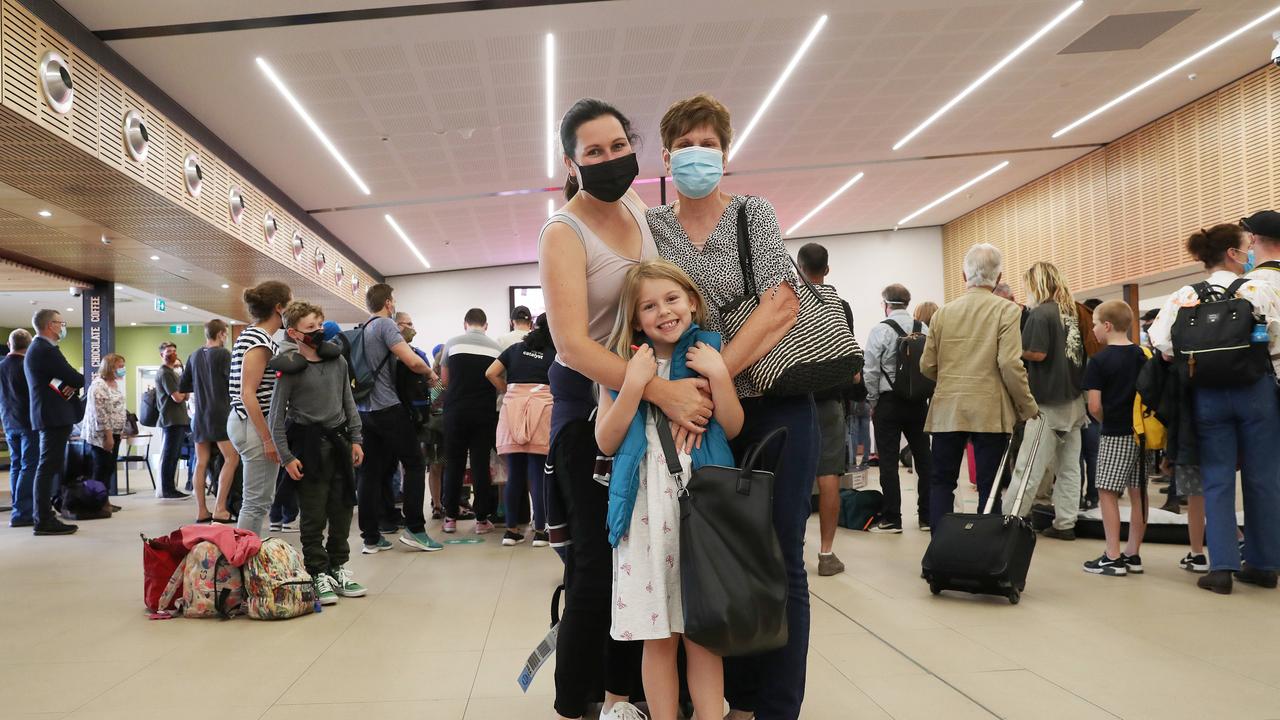 Grandmother Judy Kelly is reunited with daughter Anita Hindmarsh and granddaughter Ivy Rose Hindmarsh 6 who travelled from Sydney. Picture: Nikki Davis-Jones