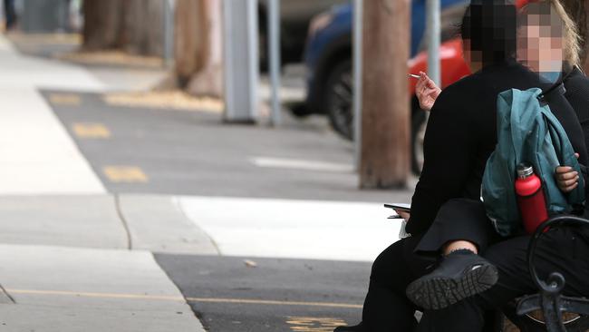 Smoking outside Geelong hospital. Picture: Mike Dugdale