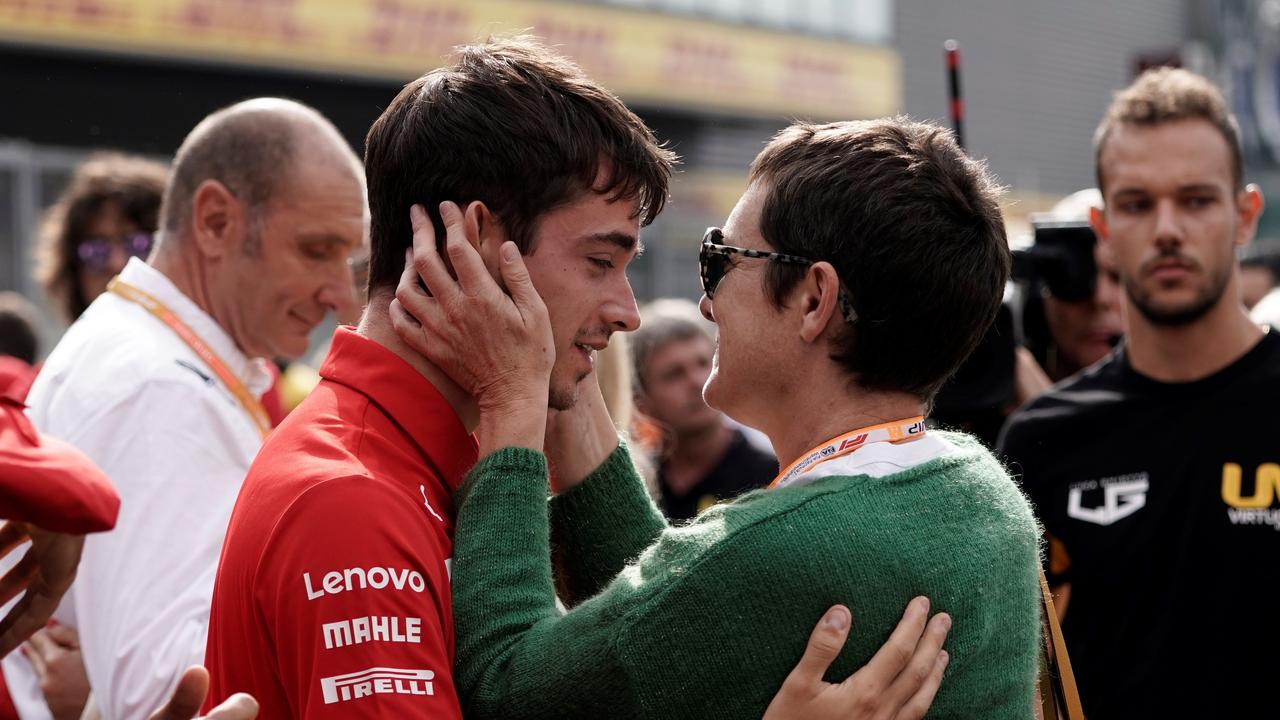 Charles Leclerc (L) presents his condolences to the mother of Anthoine Hubert.