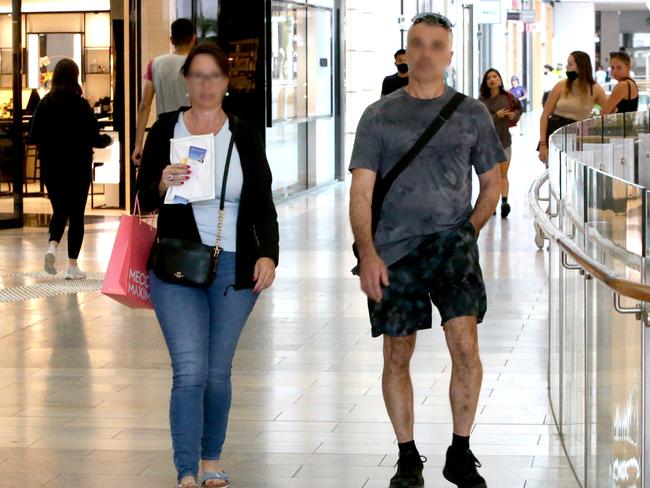 Unmasked shoppers on the Gold Coast yesterday. Picture: Steve Pohlner