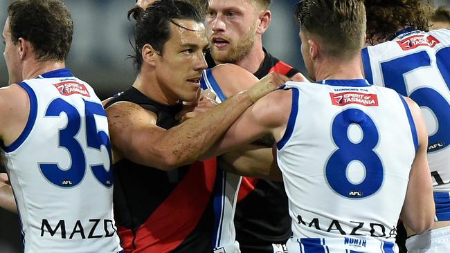 The Roos remonstrate with Shiel after his hit on Curtis Taylor. Picture: AFL Photos/Getty Images