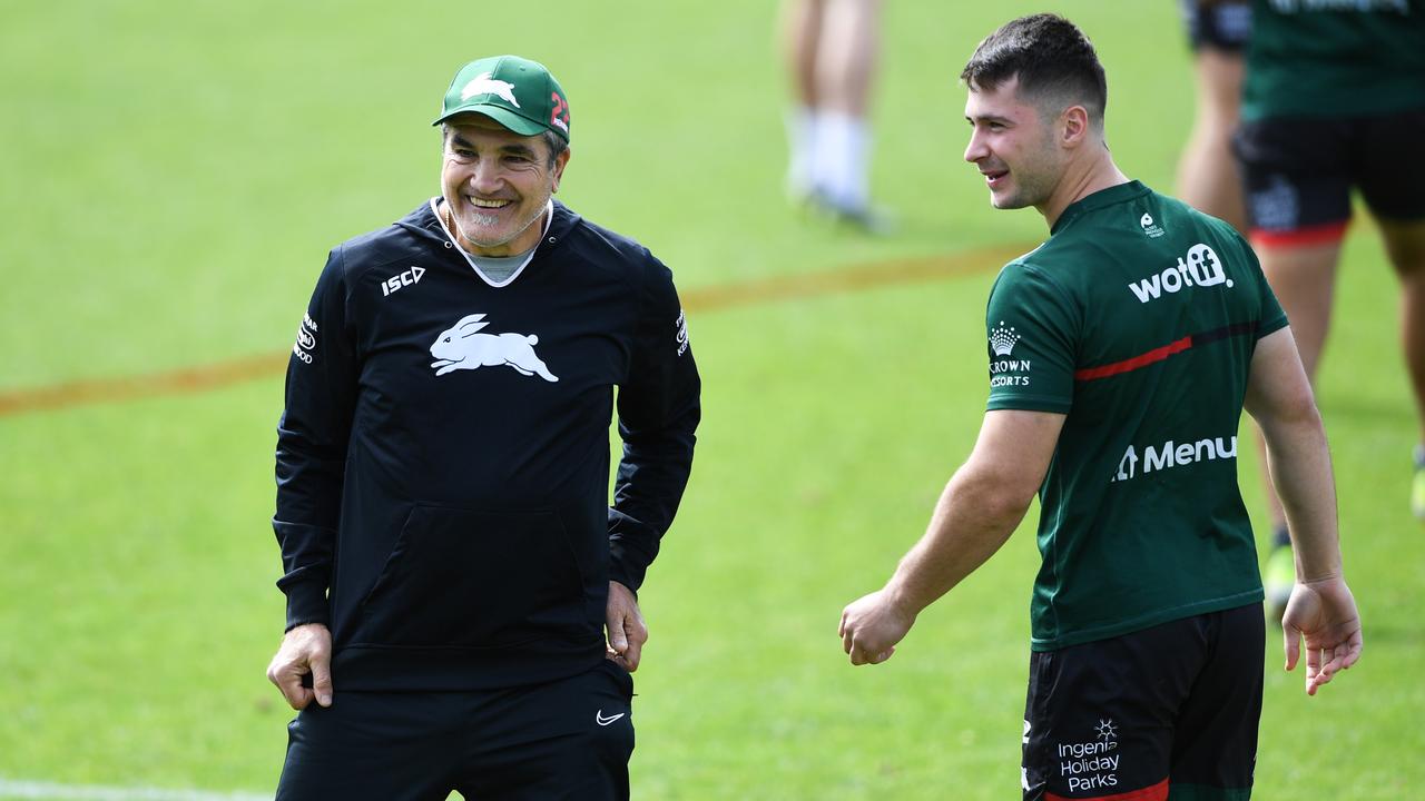 Souths legend Mario Fenech and halfback Lachlan Ilias share a laugh at training.