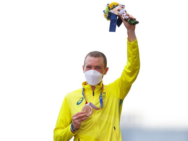 Mr Dennis shows off his bronze medal at the Tokyo Olympics. Picture: Tim de Waele/Getty Images