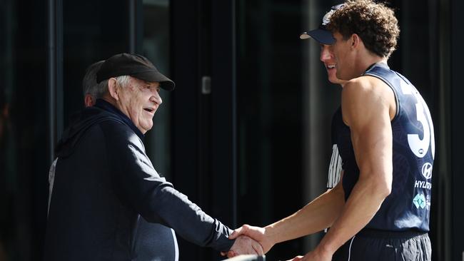 Ian Collins with Charlie Curnow at a Carlton training session. Picture: Michael Klein