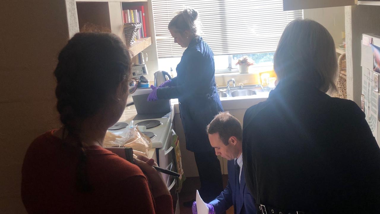 Federal Police going through Annika Smethurst’s kitchen. Picture: Supplied