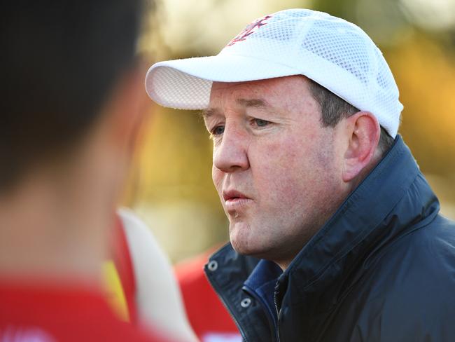 Peter Bastinac, senior coach of Montrose addresses his players during quarter time at Balwyn Park in Melbourne, Saturday, June 29, 2018. EFL (Div 1): Balwyn v Montrose. (AAP Image/James Ross) NO ARCHIVING