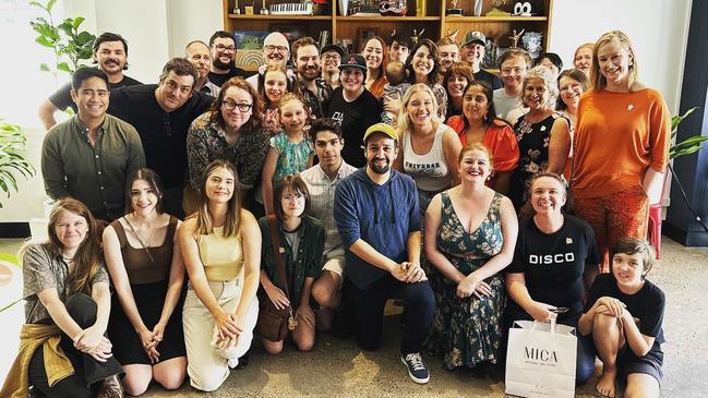 Lin-Manuel Miranda, front centre, meeting members of Ludo Studio on Saturday in Brisbane.