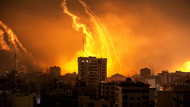 Smoke rises and billows in different regions of Gaza as the Israeli army conducts air attacks in the Gaza Strip on October 28. Picture: Ali Jadallah/Anadolu via Getty Images