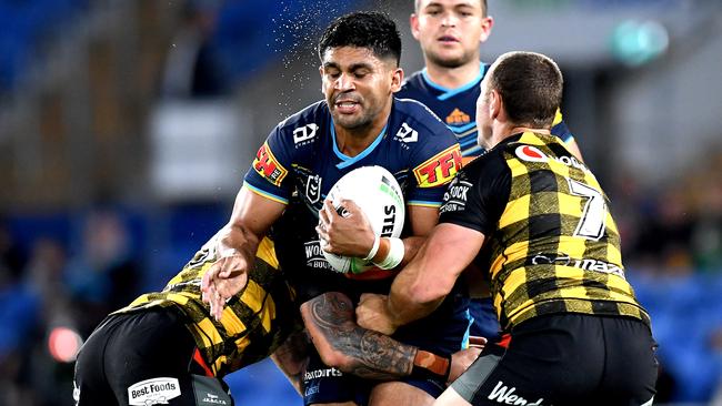 GOLD COAST, AUSTRALIA - JULY 10: Tyrone Peachey of the Titans takes on the defence during the round nine NRL match between the Gold Coast Titans and the New Zealand Warriors at Cbus Super Stadium on July 10, 2020 in Gold Coast, Australia. (Photo by Bradley Kanaris/Getty Images)